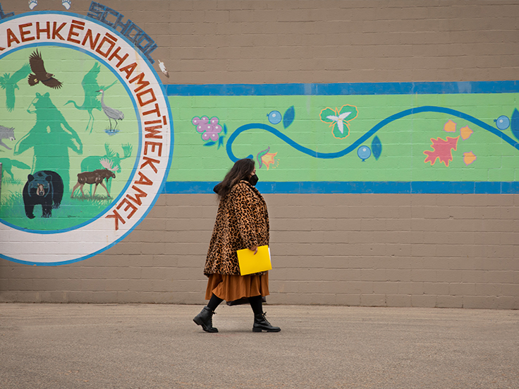 Teacher walking to her school in Menominee